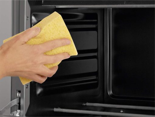 BRANDT FC215MB - Mini four - 21L - Multifonction - 5 positions de cuisson - Porte double vitre - Cavité anti-adhésive - Accessoires : lèchefrites, grille, pince pour récupérer les plats - 1380W - Noir - Image 21